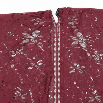 Close-up detail of Atmosphere women’s red lace kimono blouse, size M
