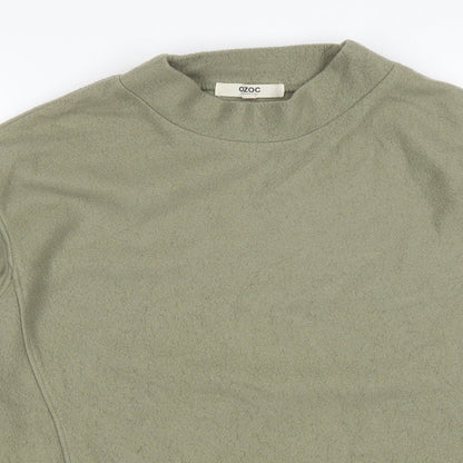 Close-up detail of ozoc women’s green jumper, size UK 38