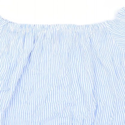 Brand and care label for Divided by H&M women’s blue striped basic blouse, size UK 6