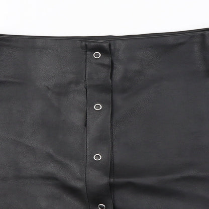 Close-up detail of PRETTYLITTLETHING women’s black a-line skirt, size UK 6