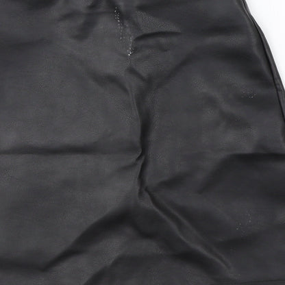 Brand and care label for PRETTYLITTLETHING women’s black a-line skirt, size UK 6