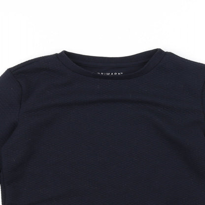 Close-up detail of Primark girls’ blue jumper, size 8-9, years