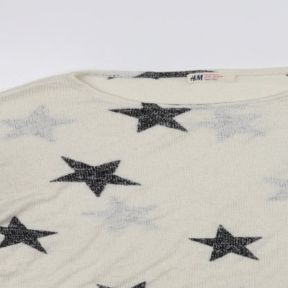 Close-up detail of H&M girls’ beige jumper, size 14, years