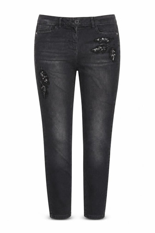 Front view of Next women’s black floral denim skinny jeans, size UK 8, 28-inch leg