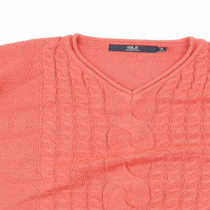 Close-up detail of Isle women’s orange argyle/diamond jumper, size M