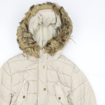 Close-up detail of H&M women’s ivory puffer jacket jacket, size UK 38