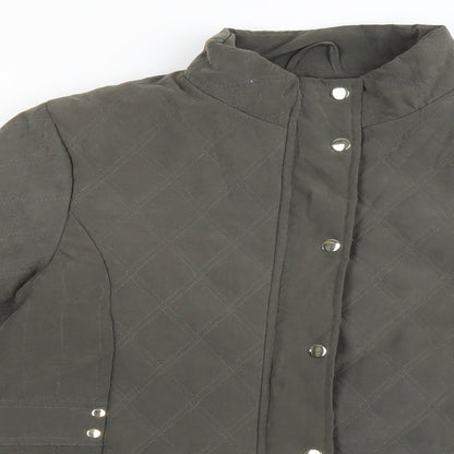 Close-up detail of EWM women’s green quilted jacket, size UK 12