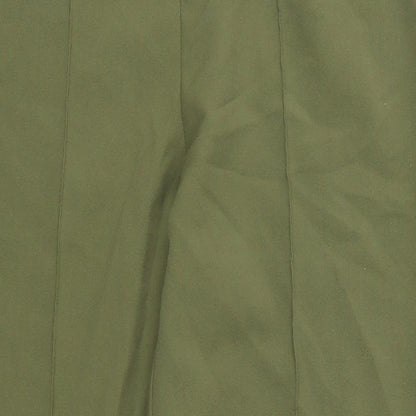 Close-up detail of Classics women’s green trousers, size UK 32, in, 27-inch leg