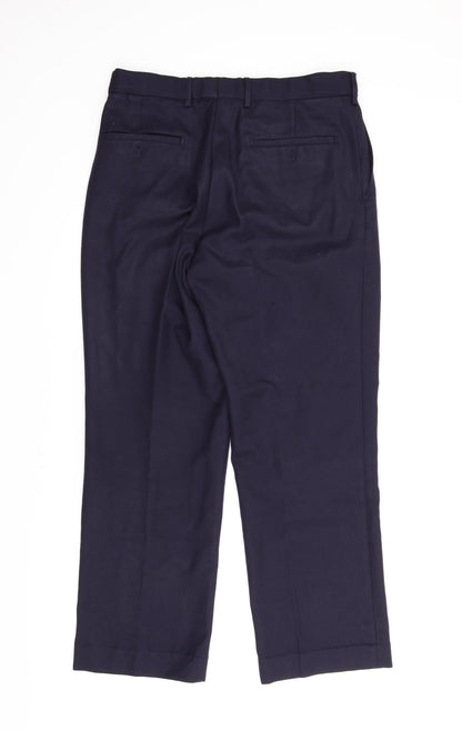 Back view of Dimensions men’s blue carpenter trousers, size 32, in, 29-inch leg