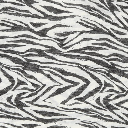Brand and care label for Next women’s grey animal print basic t-shirt, size UK 10