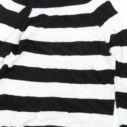 Brand and care label for Topshop women’s white striped jumper, size UK 10