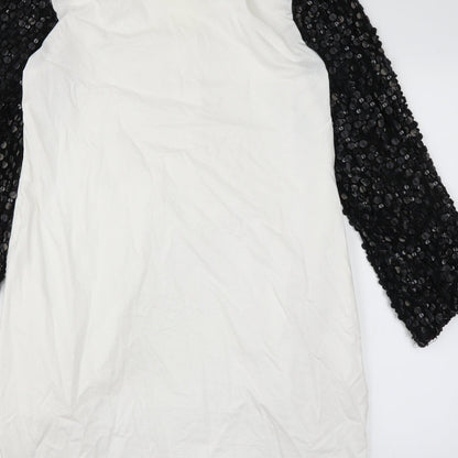 Brand and care label for embroideries gallery women’s white basic blouse, size L
