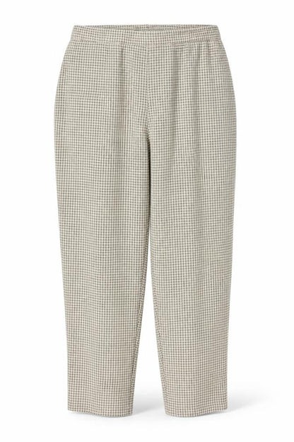 Front view of Preworn women’s white trousers, size UK 18, 27-inch leg