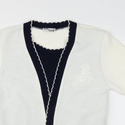 Close-up detail of Hand to Hand women’s white jumper, size M