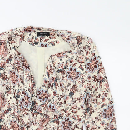 Close-up detail of New Look women’s beige floral jacket blazer, size UK 12