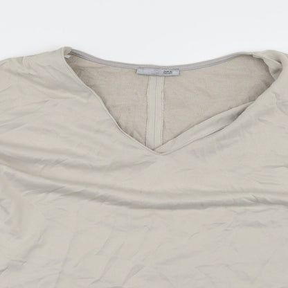 Close-up detail of Zara women’s beige basic t-shirt, size S