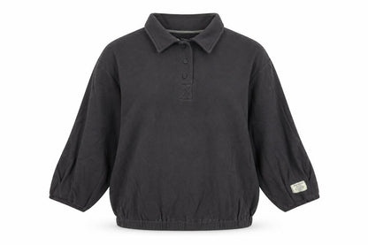 Front view of Preworn women’s green basic polo, size M
