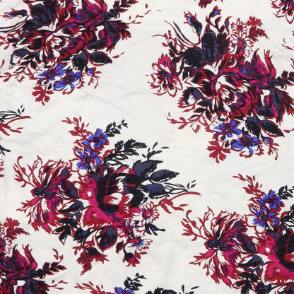 Brand and care label for Next women’s white floral knit jumper, size UK 12