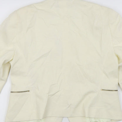 Brand and care label for Country Casuals women’s white jacket blazer, size UK 10