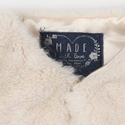 Close-up detail of Young Dimension girls’ white basic coat coatigan, size 0-3, months