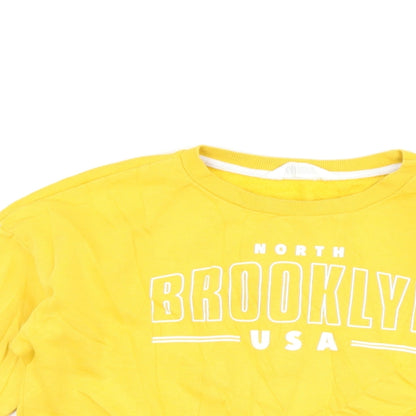 Close-up detail of H&M girls’ yellow pullover sweatshirt, size 11-12, years - brooklyn