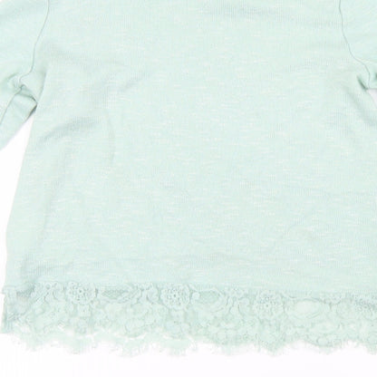 Brand and care label for H&M girls’ green jumper, size 7-8, years