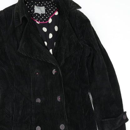 Close-up detail of Per Una women’s green jacket coat, size UK 10