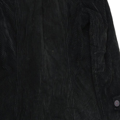 Brand and care label for Per Una women’s green jacket coat, size UK 10