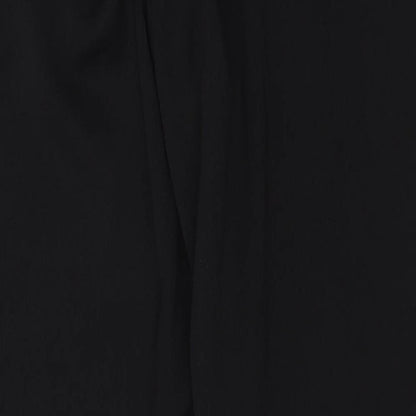 Brand and care label for Debenhams women’s black trousers, size UK 10, 29-inch leg
