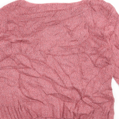 Brand and care label for Marks & Spencer women’s pink jumper, size UK 12
