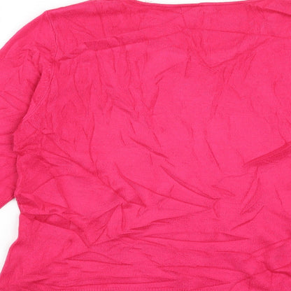 Brand and care label for M&Co women’s pink jumper, size M