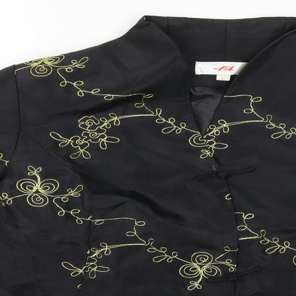 Close-up detail of ISL women’s black geometric jacket, size XL
