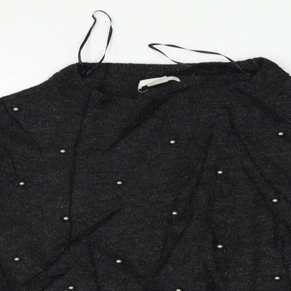 Close-up detail of H&M women’s black jumper, size UK 6