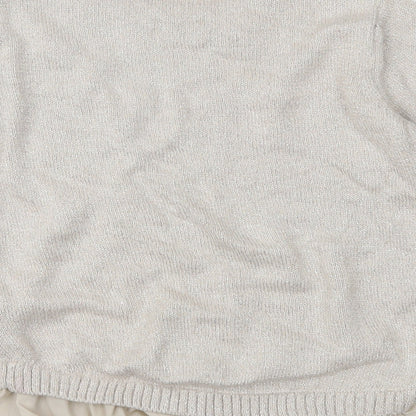 Brand and care label for Marks & Spencer girls’ beige knit jumper, size 9-10, years