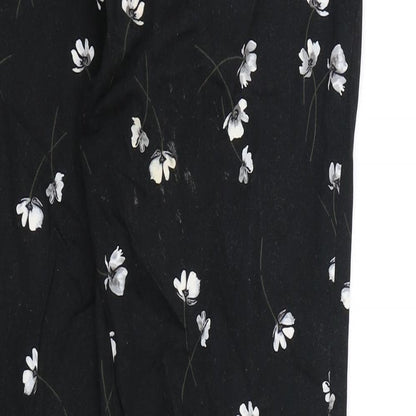 Brand and care label for RJR.John Rocha women’s black floral trousers, size UK 10, 26-inch leg