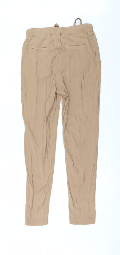 Back view of Divided by H&M women’s brown trousers, size UK 10, 30-inch leg - zip