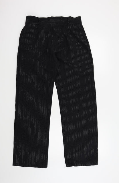 Back view of Preworn women’s black trousers, size UK 16, 30-inch leg - silver metallised fibre