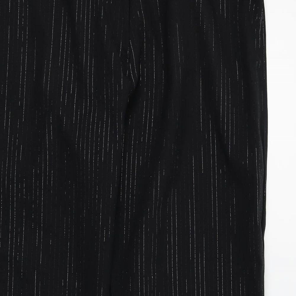 Close-up detail of Preworn women’s black trousers, size UK 16, 30-inch leg - silver metallised fibre