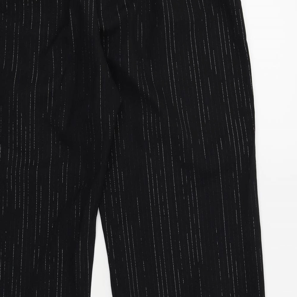 Brand and care label for Preworn women’s black trousers, size UK 16, 30-inch leg - silver metallised fibre