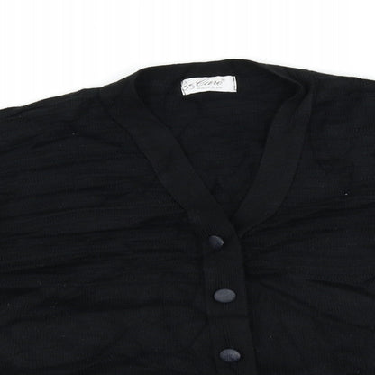 Close-up detail of care women’s black cardigan jumper, size L