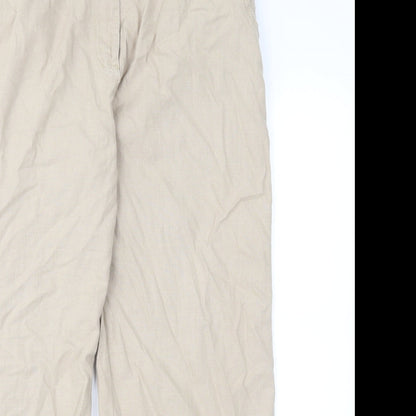 Close-up detail of Preworn women’s brown chino trousers, size UK 36, in, 27-inch leg