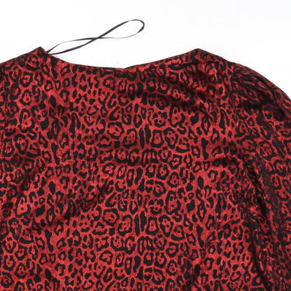 Close-up detail of Peacocks women’s red animal print basic blouse, size UK 8