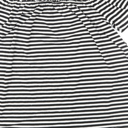 Brand and care label for Peacocks women’s black striped jersey basic blouse, size UK 8