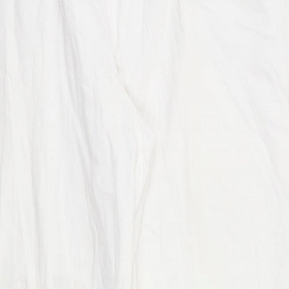Close-up detail of Epilogue women’s white trousers, size UK 14, 31-inch leg
