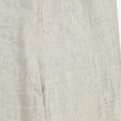 Close-up detail of Country Casuals women’s beige trousers, size UK 14, 28-inch leg