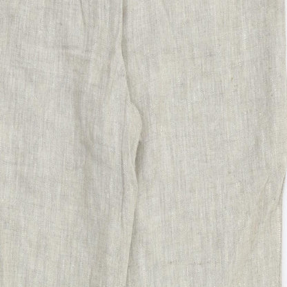Brand and care label for Country Casuals women’s beige trousers, size UK 14, 28-inch leg