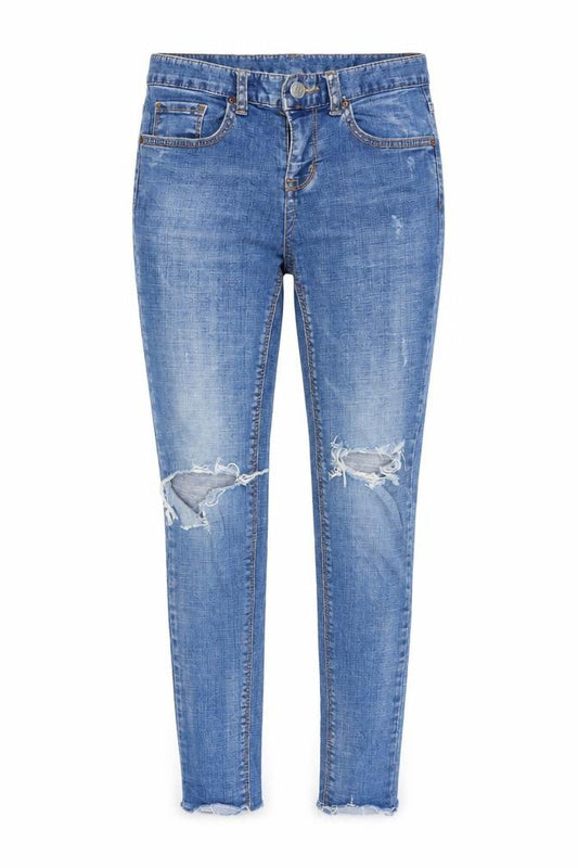 Front view of women’s blue denim skinny jeans, size UK 25, in, 28-inch leg - distressed