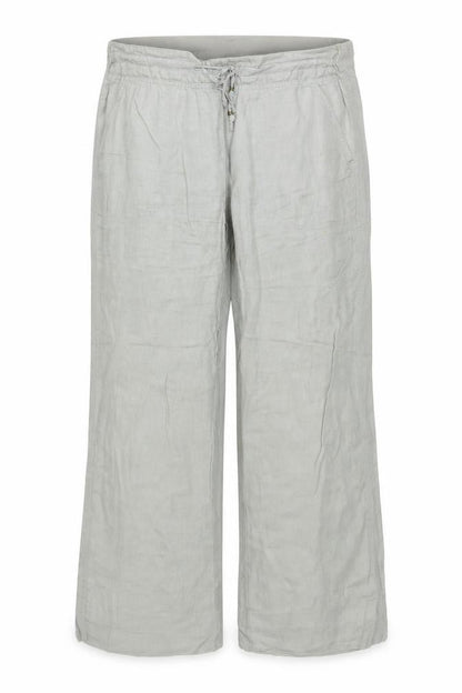 Front view of Preworn women’s green trousers, size UK 36, in, 27-inch leg