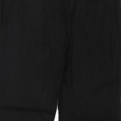 Brand and care label for South women’s black trousers, size UK 36, in, 27-inch leg