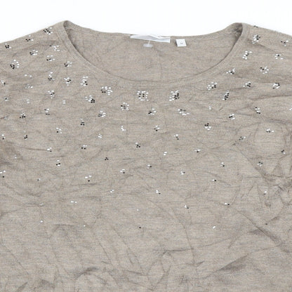 Close-up detail of Canda women’s beige jumper, size M